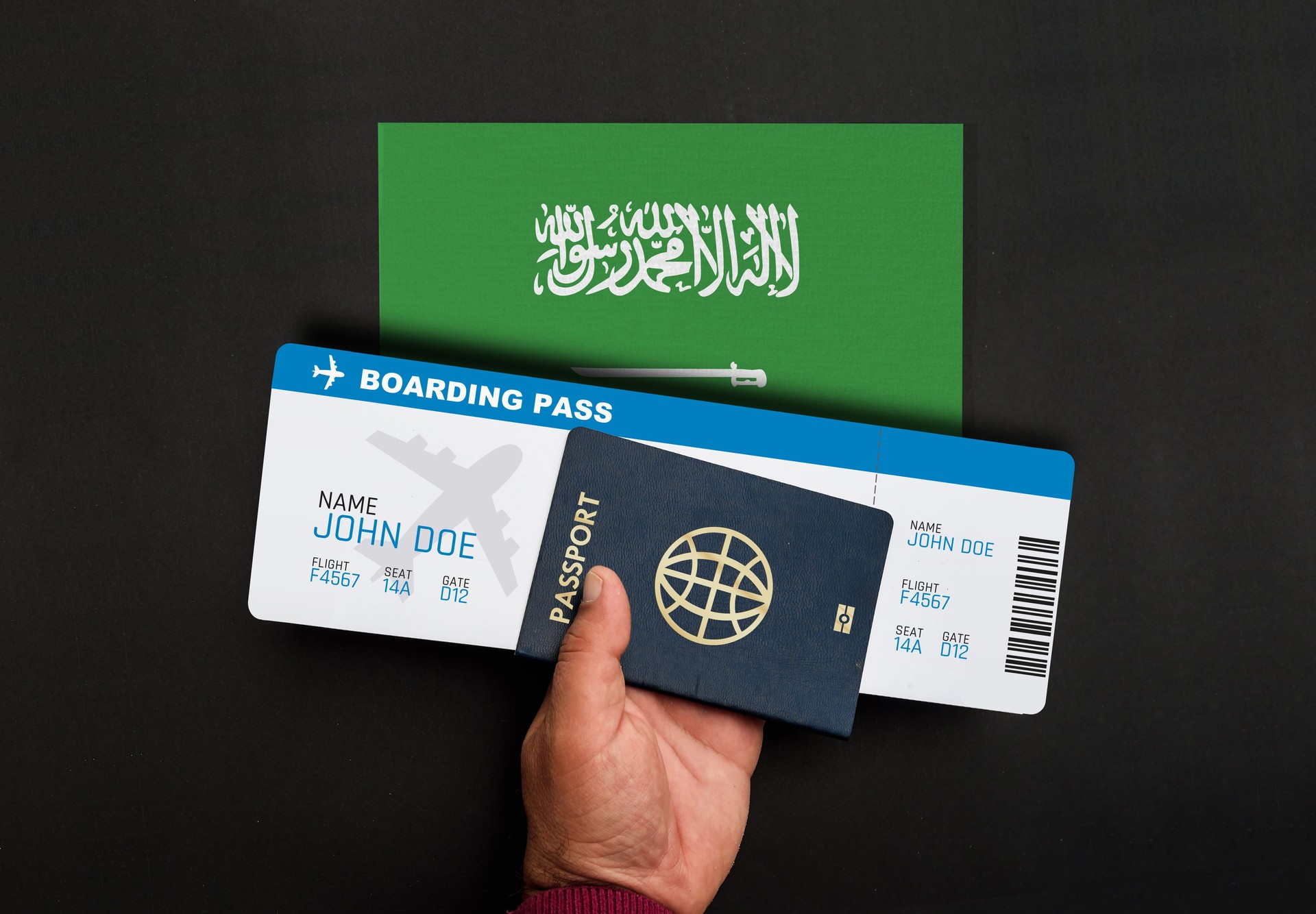 passport, boarding pass and flag of Saudi Arabia